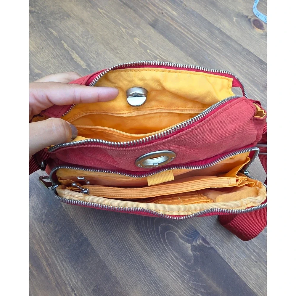 Baggallini RedOrange Nylon Crossbody Bag Travel Purse Multi Pocket Yellow Lining
